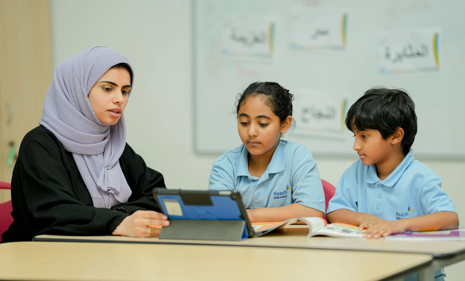 Young students listening to their teacher